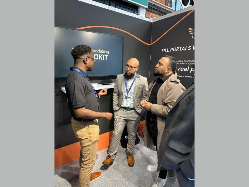 Images of the brokit team at BIBA interacting with a customer