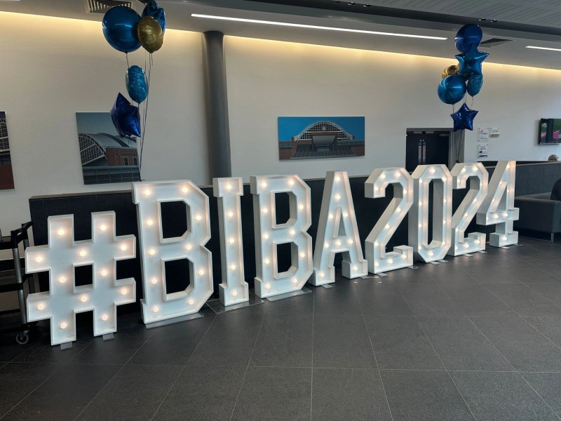 Images of the BIBA 2024 sign